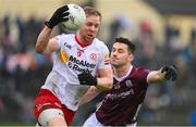 19 February 2023; Frank Burns of Tyrone in action against Ian Burke of Galway during the Allianz Football League Division One match between Galway and Tyrone at St Jarlath's Park in Tuam, Galway. Photo by Brendan Moran/Sportsfile