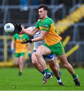 19 February 2023; Michael Langan of Donegal in action against Dessie Ward of Monaghan during the Allianz Football League Division One match between Monaghan and Donegal at St Tiernach's Park in Clones, Monaghan. Photo by Ramsey Cardy/Sportsfile