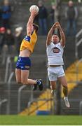 19 February 2023; Darragh Bohannon of Clare in action against Ben McCormack of Kildare during the Allianz Football League Division Two match between Clare and Kildare at Cusack Park in Ennis, Clare. Photo by Seb Daly/Sportsfile