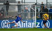 19 February 2023; Enda Smith of Roscommon shoots to score his side's first goal past Armagh goalkeeper Ethan Rafferty during the Allianz Football League Division One match between Roscommon and Armagh at Dr Hyde Park in Roscommon. Photo by Harry Murphy/Sportsfile