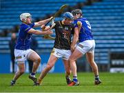 19 February 2023; John Donnelly of Kilkenny in action against Tipperary players John Campion and Enda Heffernan, right, during the Dillon Quirke Foundation Hurling Challenge match between Tipperary and Kilkenny at FBD Semple Stadium in Thurles, Tipperary. Photo by Piaras Ó Mídheach/Sportsfile