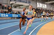19 February 2023; Iseult O'Donnell of Raheny Shamrock AC, Dublin, centre, on her way to win the senior women's 800m, ahead of Nadia Power of Dublin City Harriers AC, Dublin, left, who finished second, during day two of the 123.ie National Senior Indoor Championships at National Indoor Arena in Dublin. Photo by Sam Barnes/Sportsfile