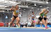 19 February 2023; Joan Healy of Leevale AC, Cork, right, dips for the line to finish second in the senior women's 60m, behind Sarah Leahy of Killarney Valley AC, Kerry, right, who finished first, during day two of the 123.ie National Senior Indoor Championships at National Indoor Arena in Dublin. Photo by Sam Barnes/Sportsfile