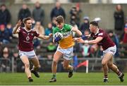19 February 2023; Rory Egan of Offaly in action against Kevin Maguire and Nigel Harte of Westmeath during the Allianz Football League Division Three match between Westmeath and Offaly at TEG Cusack Park in Mullingar, Westmeath. Photo by Stephen Marken/Sportsfile