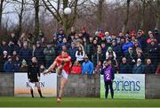 19 February 2023; Supporters look on as Sam Mulroy of Louth kicks a free during the Allianz Football League Division Two match between Louth and Limerick at Páirc Mhuire in Ardee, Louth. Photo by Ben McShane/Sportsfile
