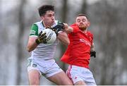 19 February 2023; Colm McSweeney of Limerick in action against Niall Sharkey of Louth during the Allianz Football League Division Two match between Louth and Limerick at Páirc Mhuire in Ardee, Louth. Photo by Ben McShane/Sportsfile