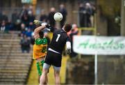 19 February 2023; Rory Beggan of Monaghan in action against Caolan McGonagle of Donegal during the Allianz Football League Division One match between Monaghan and Donegal at St Tiernach's Park in Clones, Monaghan. Photo by Philip Fitzpatrick/Sportsfile
