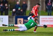 19 February 2023; Craig Lennon of Louth has a shot on goal saved by Limerick goalkeeper Donal O'Sullivan during the Allianz Football League Division Two match between Louth and Limerick at Páirc Mhuire in Ardee, Louth. Photo by Ben McShane/Sportsfile