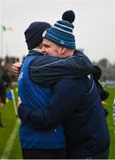 19 February 2023; Roscommon manager Davy Burke embraces team doctor Martin Daly after their side's victory in the Allianz Football League Division One match between Roscommon and Armagh at Dr Hyde Park in Roscommon. Photo by Harry Murphy/Sportsfile