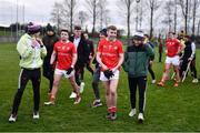 19 February 2023; Louth players, including Peter Lynch, centre, celebrate with the supporters after their side's victory in the Allianz Football League Division Two match between Louth and Limerick at Páirc Mhuire in Ardee, Louth. Photo by Ben McShane/Sportsfile