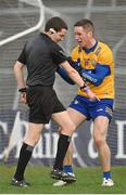 19 February 2023; Eoin Cleary of Clare remonstrates with referee David Murnane after an injury time free is awarded against his side during the Allianz Football League Division Two match between Clare and Kildare at Cusack Park in Ennis, Clare. Photo by Seb Daly/Sportsfile