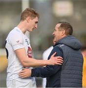 19 February 2023; Daniel Flynn of Kildare and Clare manager Colm Collins after the Allianz Football League Division Two match between Clare and Kildare at Cusack Park in Ennis, Clare. Photo by Seb Daly/Sportsfile