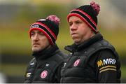 19 February 2023; Tyrone joint managers Brian Dooher, left, and Feargal Logan during the Allianz Football League Division One match between Galway and Tyrone at St Jarlath's Park in Tuam, Galway. Photo by Brendan Moran/Sportsfile