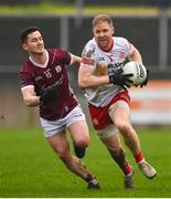 19 February 2023; Frank Burns of Tyrone in action against Ian Burke of Galway during the Allianz Football League Division One match between Galway and Tyrone at St Jarlath's Park in Tuam, Galway. Photo by Brendan Moran/Sportsfile