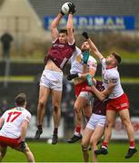 19 February 2023; Matthew Tierney of Galway catches a mark ahead of Tyrone players Padraig Hampsey and Cormac Quinn during the Allianz Football League Division One match between Galway and Tyrone at St Jarlath's Park in Tuam, Galway. Photo by Brendan Moran/Sportsfile