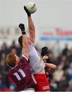 19 February 2023; Brian Kennedy of Tyrone in action against Peter Cooke of Galway during the Allianz Football League Division One match between Galway and Tyrone at St Jarlath's Park in Tuam, Galway. Photo by Brendan Moran/Sportsfile