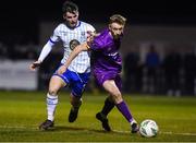17 February 2023; Reece Webb of Wexford in action against Ryan Burke of Waterford during the SSE Airtricity Men's First Division match between Wexford and Waterford at Ferrycarrig Park in Wexford. Photo by Matt Browne/Sportsfile