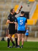 19 February 2023; Lee Gannon of Dublin is shown a red card by referee Seamus Mulhare during the Allianz Football League Division Two match between Cork and Dublin at Páirc Ui Chaoimh in Cork. Photo by Eóin Noonan/Sportsfile