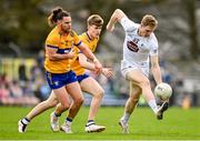 19 February 2023; Daniel Flynn of Kildare in action against Cian O’Dea, left, and Brendan Rouine of Clare during the Allianz Football League Division Two match between Clare and Kildare at Cusack Park in Ennis, Clare. Photo by Seb Daly/Sportsfile