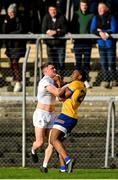 19 February 2023; Jimmy Hyland of Kildare and Iken Ugwueru of Clare tussle off the ball during the Allianz Football League Division Two match between Clare and Kildare at Cusack Park in Ennis, Clare. Photo by Seb Daly/Sportsfile