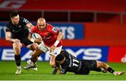 17 February 2023; Simon Zebo of Munster is tackled by Keelan Giles, right, and Owen Watkin of Ospreys during the United Rugby Championship match between Munster and Ospreys at Thomond Park in Limerick. Photo by Sam Barnes/Sportsfile