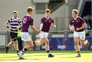 20 February 2023; Tom Murtagh of Clongowes Wood College, centre, celebrates scoring a penalty with teammate Harry Mallon during the Bank of Ireland Schools Senior Cup First Round replay match between Terenure College and Clongowes Wood College at Energia Park in Dublin. Photo by Harry Murphy/Sportsfile
