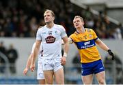 19 February 2023; Darragh Kirwan of Kildare and Pearse Lillis of Clare during the Allianz Football League Division Two match between Clare and Kildare at Cusack Park in Ennis, Clare. Photo by Seb Daly/Sportsfile