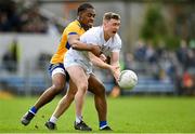 19 February 2023; Jimmy Hyland of Kildare in action against Iken Ugwueru of Clare during the Allianz Football League Division Two match between Clare and Kildare at Cusack Park in Ennis, Clare. Photo by Seb Daly/Sportsfile