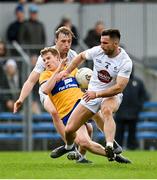 19 February 2023; Pádraic Collins of Clare in action against Ryan Houlihan and Darragh Kirwan of Kildare during the Allianz Football League Division Two match between Clare and Kildare at Cusack Park in Ennis, Clare. Photo by Seb Daly/Sportsfile