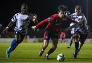 18 February 2023; Sam Verdon of Longford Town in action against Frantz Pierrot, left, and Donal Curtin of Athlone Town during the SSE Airtricity Men's First Division match between Longford Town and Athlone Town at Bishopsgate in Longford. Photo by Michael P Ryan/Sportsfile