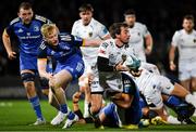 18 February 2023; Rhodri Williams of Dragons is tackled by John McKee, right, and Jamie Osborne of Leinster during the United Rugby Championship match between Leinster and Dragons at RDS Arena in Dublin. Photo by Tyler Miller/Sportsfile