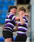 20 February 2023; Caspar Gabriel-Lorin of Terenure College celebrates with teammate Keith Byrne after scoring his side's second try during the Bank of Ireland Schools Senior Cup First Round replay match between Terenure College and Clongowes Wood College at Energia Park in Dublin. Photo by Harry Murphy/Sportsfile