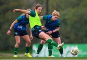 20 February 2023; Kyra Carusa is tackled by Aoife Mannion, right, during a Republic of Ireland women training session at Dama de Noche Football Center in Marbella, Spain. Photo by Stephen McCarthy/Sportsfile