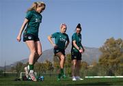 21 February 2023; Players, from left, Megan Connolly, Denise O'Sullivan and Áine O'Gorman perform Irish dancing after a Republic of Ireland women training session at Dama de Noche Football Center in Marbella, Spain. Photo by Stephen McCarthy/Sportsfile