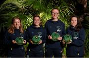 21 February 2023; Players, from left, Harriet Scott, Jamie Finn, Louise Quinn and Lucy Quinn pose with their Republic of Ireland 2022-2023 cap during a presentation at the team hotel in Marbella, Spain. Photo by Stephen McCarthy/Sportsfile