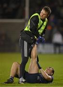 18 February 2023; Dara Moynihan of Kerry has help with cramp from chartered physiotherapist Jimmy Galvin during the Allianz Football League Division One match between Mayo and Kerry at Hastings Insurance MacHale Park in Castlebar, Mayo. Photo by Brendan Moran/Sportsfile