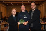 21 February 2023; Megan Campbell is presented with her Republic of Ireland 2022-2023 cap by FAI head of women’s and girl’s football Eileen Gleeson and FAI director of football Marc Canham during a presentation at the team hotel in Marbella, Spain. Photo by Stephen McCarthy/Sportsfile