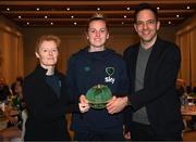 21 February 2023; Claire Walsh is presented with her Republic of Ireland 2022-2023 cap by FAI head of women’s and girl’s football Eileen Gleeson and FAI director of football Marc Canham during a presentation at the team hotel in Marbella, Spain. Photo by Stephen McCarthy/Sportsfile