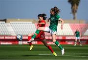 22 February 2023; Heather Payne of Republic of Ireland in action against Yao Lingwei of China PR during the international friendly match between China PR and Republic of Ireland at Estadio Nuevo Mirador in Algeciras, Spain. Photo by Stephen McCarthy/Sportsfile