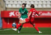 22 February 2023; Deborah-Anne de la Harpe of Republic of Ireland in action against Zhang Xin of China PR during the international friendly match between China PR and Republic of Ireland at Estadio Nuevo Mirador in Algeciras, Spain. Photo by Stephen McCarthy/Sportsfile