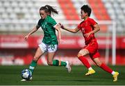 22 February 2023; Heather Payne of Republic of Ireland in action against Lou Jiahui of China PR during the international friendly match between China PR and Republic of Ireland at Estadio Nuevo Mirador in Algeciras, Spain. Photo by Stephen McCarthy/Sportsfile