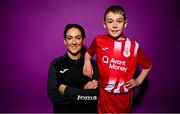 21 February 2023; Player welfare officer Elaine Crossin and team mascot Conor Crossin poses for a portrait during a Sligo Rovers squad portrait session at The Showgrounds in Sligo. Photo by Eóin Noonan/Sportsfile