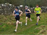 22 February 2023; Padraig Corduff of Rice College Westport in Mayo, left, Ruairi Hollywood of Rice College Westport in Mayo, centre, and Enda Jennings of St Colman's Claremorris in Mayo in the senior boys event during the 123.ie Connacht Schools’ Cross Country Championships at Bushfield in Loughrea, Galway. Photo by Piaras Ó Mídheach/Sportsfile