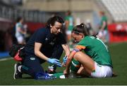 22 February 2023; Katie McCabe of Republic of Ireland receives medical attention from physiotherapist Angela Kenneally during the international friendly match between China PR and Republic of Ireland at Estadio Nuevo Mirador in Algeciras, Spain. Photo by Stephen McCarthy/Sportsfile