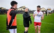 19 February 2023; Referee Brendan Cawley performs the coin toss in the company of team captains Seán Kelly of Galway, left, and Padraig Hampsey of Tyrone before the Allianz Football League Division One match between Galway and Tyrone at St Jarlath's Park in Tuam, Galway. Photo by Brendan Moran/Sportsfile