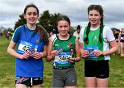 22 February 2023; Winner of the junior girls event Emma Brennan of Moyne Community School in Longford, centre, with Maria McDonnell of Sacred Heart Westport in Mayo, left, who finished third, and Niamh Moran of Davitt College Castlebar in Mayo, who finished second, during the 123.ie Connacht Schools’ Cross Country Championships at Bushfield in Loughrea, Galway. Photo by Piaras Ó Mídheach/Sportsfile