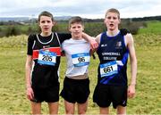 22 February 2023; Winner of the junior boys event Oisin Maher of Clifden Community School in Galway, centre, with Luke Walsh of Gort Community School in Galway left, who finished third, and Gearoid Tuohy of Summerhill College Sligo, who finished second, during the 123.ie Connacht Schools’ Cross Country Championships at Bushfield in Loughrea, Galway. Photo by Piaras Ó Mídheach/Sportsfile