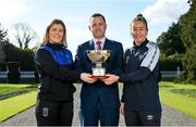 23 February 2023; Athlone Town captain Laurie Ryan, left, League of Ireland director Mark Scanlon, and Shelbourne captain Pearl Slattery with FAI Women's President's Cup during a reception with the President of Ireland Michael D Higgins at Áras an Uachtaráin in the Phoenix Park, Dublin. Photo by Seb Daly/Sportsfile