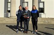 23 February 2023; The President of Ireland Michael D Higgins receives the team captains of the FAI Women's President's Cup, Pearl Slattery of Shelbourne, left, and Laurie Ryan of Athlone Town, at Áras an Uachtaráin in the Phoenix Park, Dublin. Photo by Seb Daly/Sportsfile