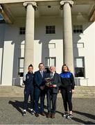23 February 2023; The President of Ireland Michael D Higgins receives the team captains of the FAI Women's President's Cup, Pearl Slattery of Shelbourne, left, and Laurie Ryan of Athlone Town, and League of Ireland director Mark Scanlon, at Áras an Uachtaráin in the Phoenix Park, Dublin. Photo by Seb Daly/Sportsfile